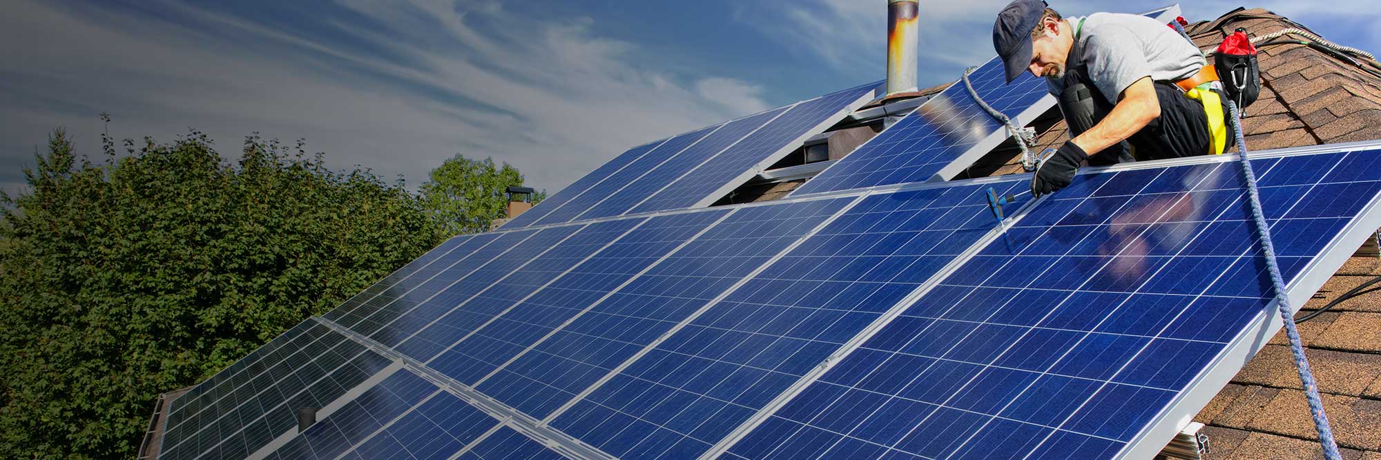 Man installing solar panels